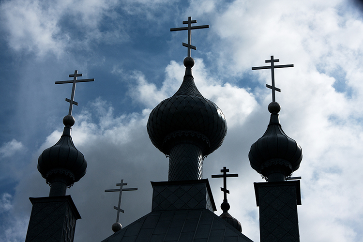 Tri-bar crosses on top of Orthodox Christian Church.